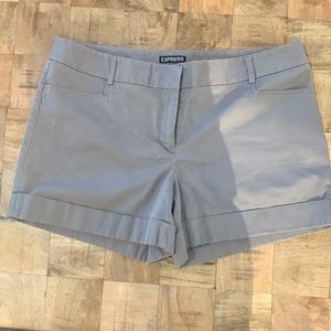 Express Editor shorts. 4” inseam. Small size pockets (won’t fit a phone).